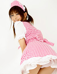 Sexy Asian teen wears a kinky outfit.