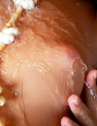 Macy B is getting all wet and slippery in the bath tub today.