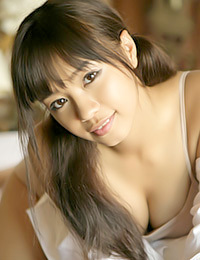 Sexy Asian babe gets in the bathtub.